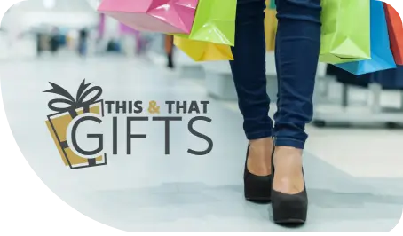 This & That Gifts logo with lady shopping